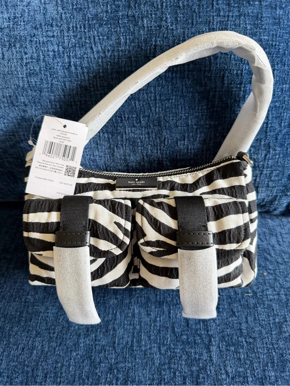 Kate Spade Carter Zebra Cargo Crossbody Bag in black and white